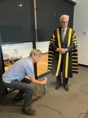 Mark Scott Vice Chancellor being photographed by Simon Fieldhouse